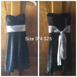 Black and silver homecoming dress. Worn twice. Size 3/4.